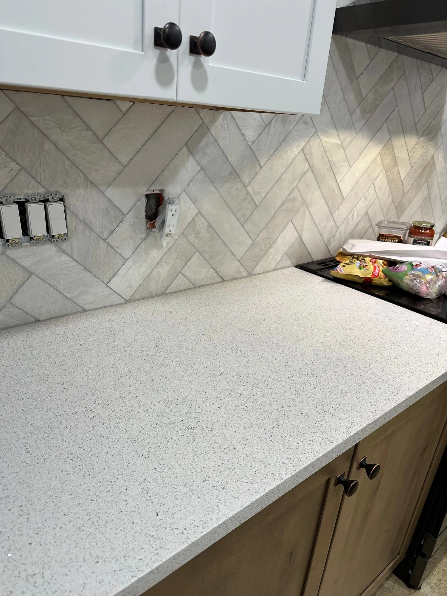 Kitchen island build with seating and pendant lighting